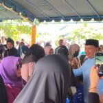 Kesejahteraan Masyarakat Jadi Prioritas: Madri Pani-Agus Wahyudi di Tengah Hujan